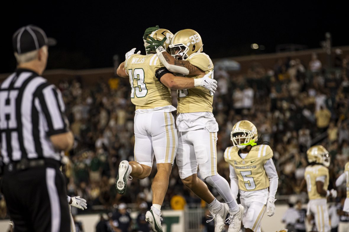 Football Players Jumping